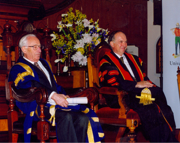 Two men in academic regalia