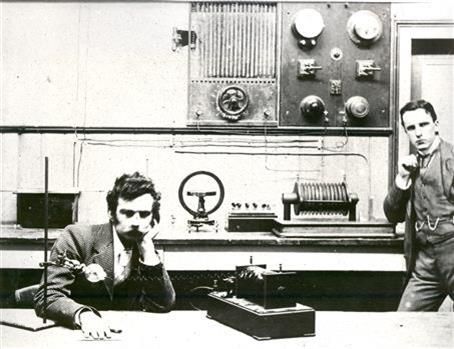 Two men conduct an xray