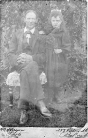 Photograph - Black and White, H.A. Brown, Seated man with child, c1900