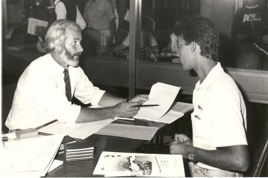 Two men at a desk