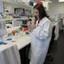 A woman works in a laboratory