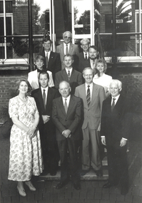 12 people on the steps of the former Ballarat East Town Hall