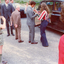 Prince Charles is presented with a flower before entering his car