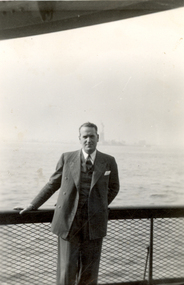 Photograph - Black and White, Frank Wright with the Statue of Liberty in the Distance, mid 1900's