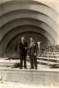 Photograph - Black and White, Frank Wright and companion in an empty music bowl, mid 1900's