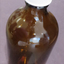 Brown bottle with white lid