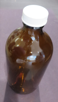 Brown bottle with white lid