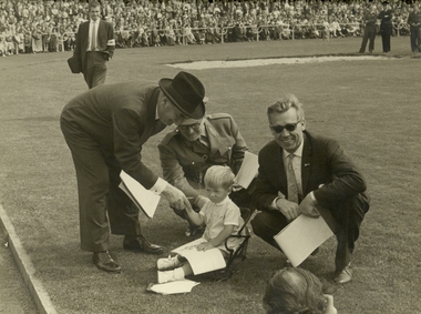 Photograph - Black and White, Foto: Vinders, Frank Wright, Officials and Child at Kerkrade, 1960's