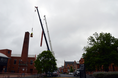 Photograph - Colour, Phil Bryce, Removal of a fibre-glass chimney extension from a chimney from the former Ballarat Brewery, 2015, 13/11/2015