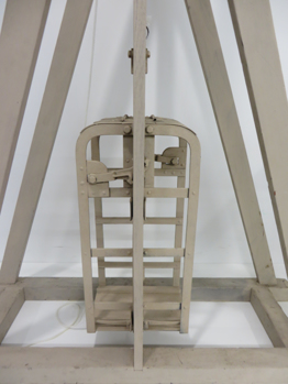 Close up view of model of Allan Mine Cage Safety Brake
