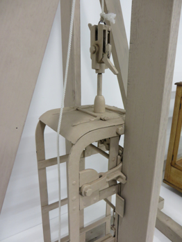 very close up view of model of Allan Mine Cage Safety Brake