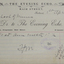Invoices glued into a scrapbook