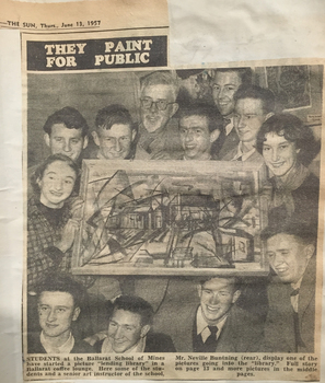 A group around an artwork