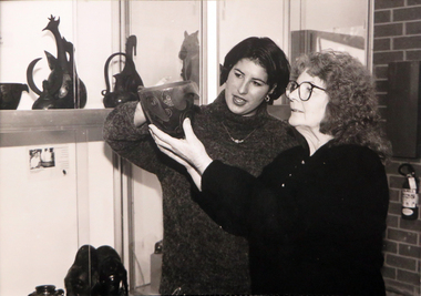 Photograph - Photograph - Black and White, Miriam Gould and Pat Guy observe a pot