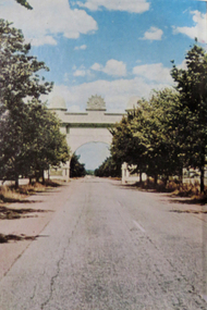 Photograph of an arch and avenue of honour