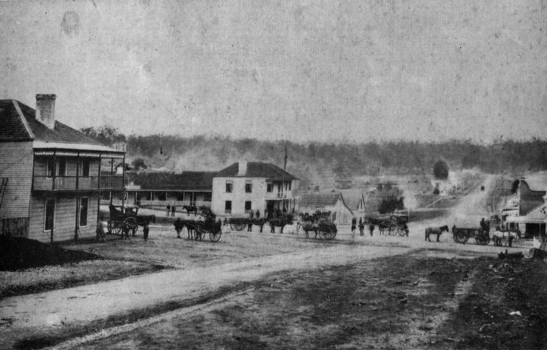 Buninyong streetscape with horsedrawn carriages.