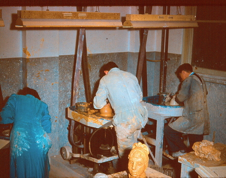 Ceramic Students working on potters wheels