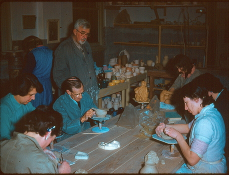 Ceramic student working with Neville Bunning