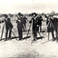 12 men during a surveying activity