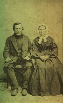 A seated man and woman