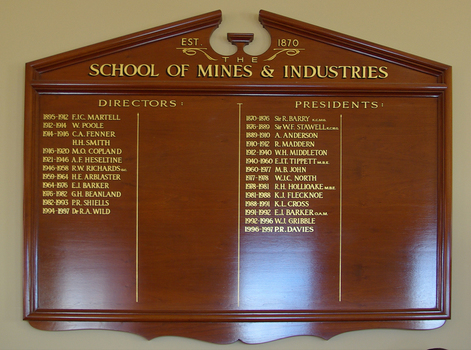 Board with gold list of names