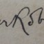 Signature in front of book
