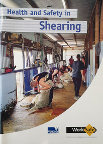 Cover to a book with an image within a shearing shed