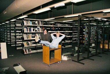 Photograph, Staff Shelving Books in the Newly Built E.J. Tippett Library at the Ballarat School of Mines