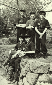 5  uniformed baseball players