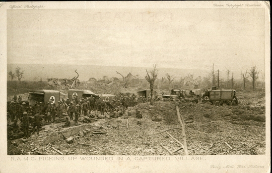 Photograph with soldiers and ambulance