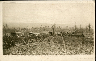 Photograph with soldiers and ambulance