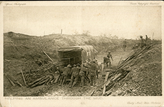 Soldiers pushing an ambulance