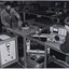 Two students working on electrical equipment