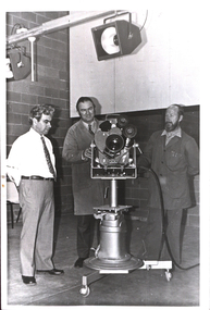 Photograph - Black and White Photograph, Two men with a television camera
