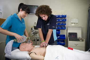 Student nurses working an a dummy at the Federation University Gippsland Campus