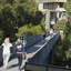 Students walking across a bridge