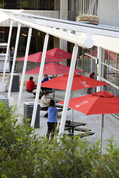 Red Umbrellas outside a building