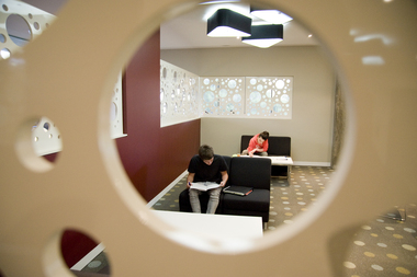 Two students in a library