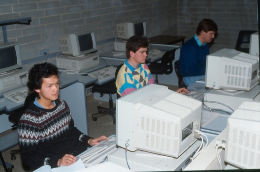3 students in a computer laboratory