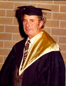 man in academic regalia