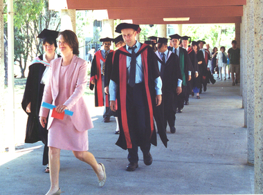 A procession of people in academic regalia