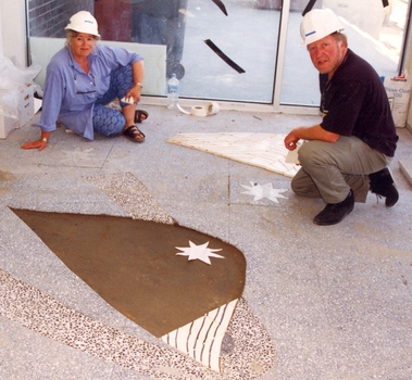 Two people with the Ceramic artwork