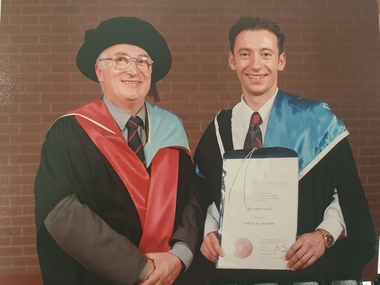 Two men in academic regalia