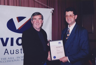Photograph - Photograph -colour, VIOSH Australia Annual Dinner, July 1999: Presentation of Award to John MacLean