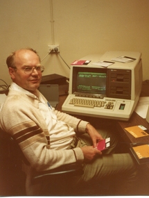 Photograph, Man with Computer at the Gippsland Institute of Advanced Education Campus, c2000