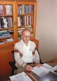 Photograph, Two photos of an academic at the Gippsland Institute of Advanced Education Campus, c2000