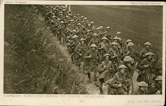 Marching soldiers wearing tin helmets