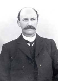Portrait of a man with moustache