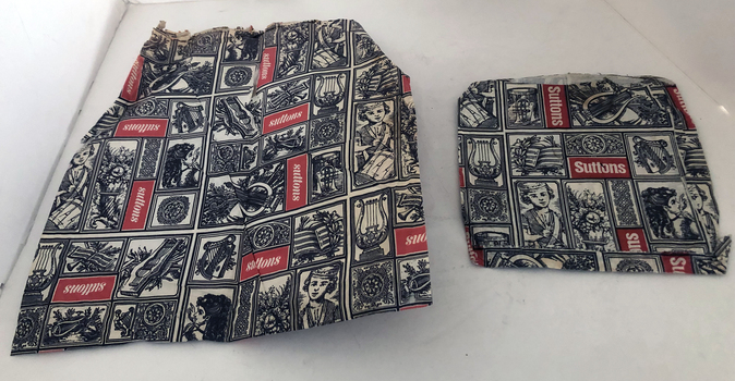 Small and large paper bag with red Suttons and black and white pictures 