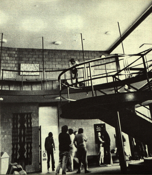 People around a staircase